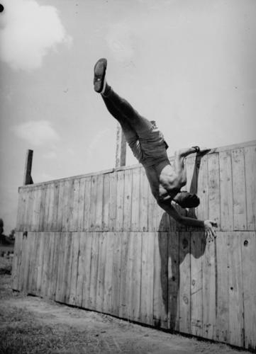 army-recruit-is-in-training-at-the-army-physical-training-school-brisbane-1942